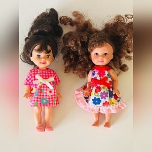 Kelly doll and her friend Barbie doll